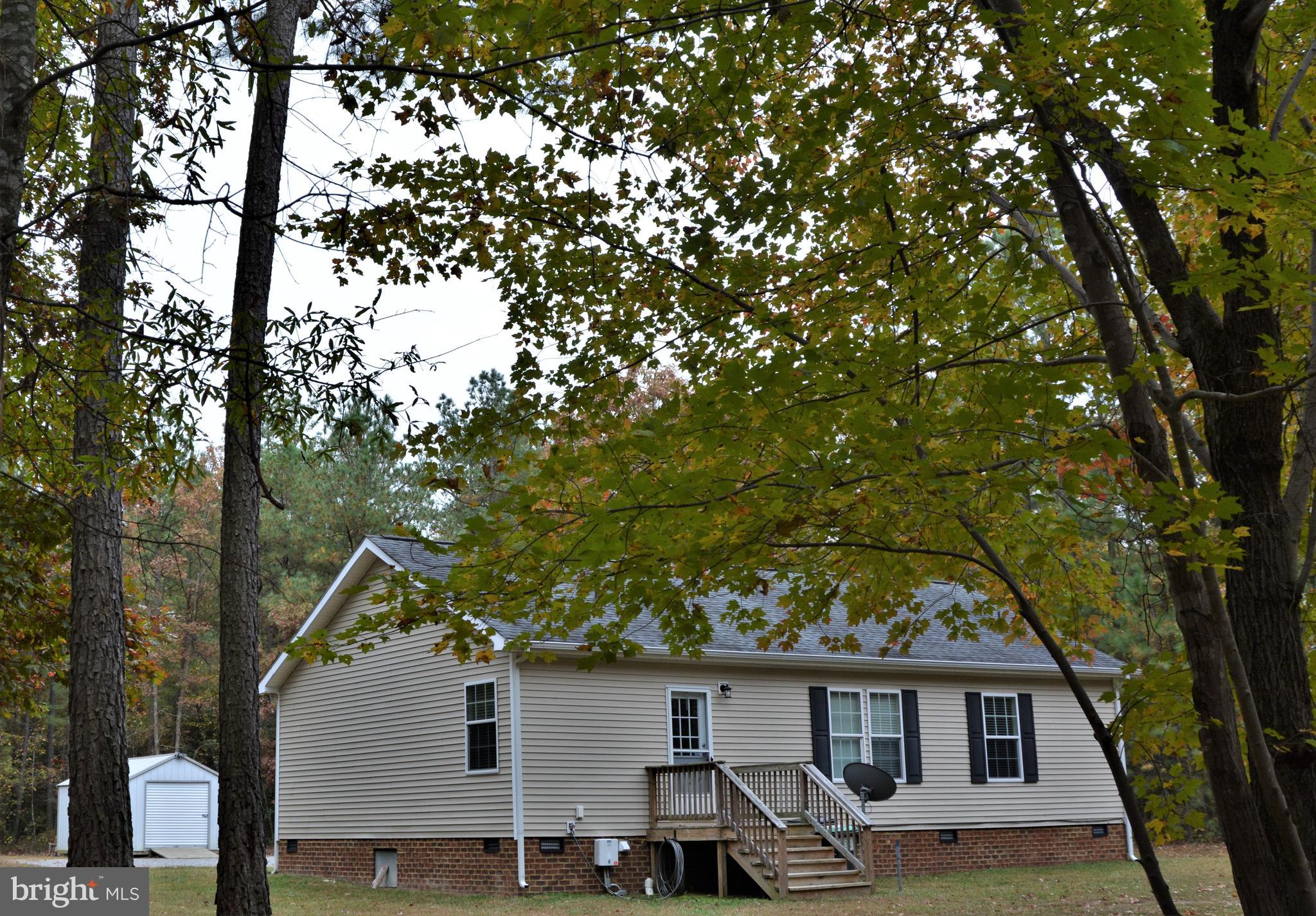 7515 Tate Road Ruther Glen, VA 22546 - Photo 24 of 28 Beautiful backyard surrounded by nature.