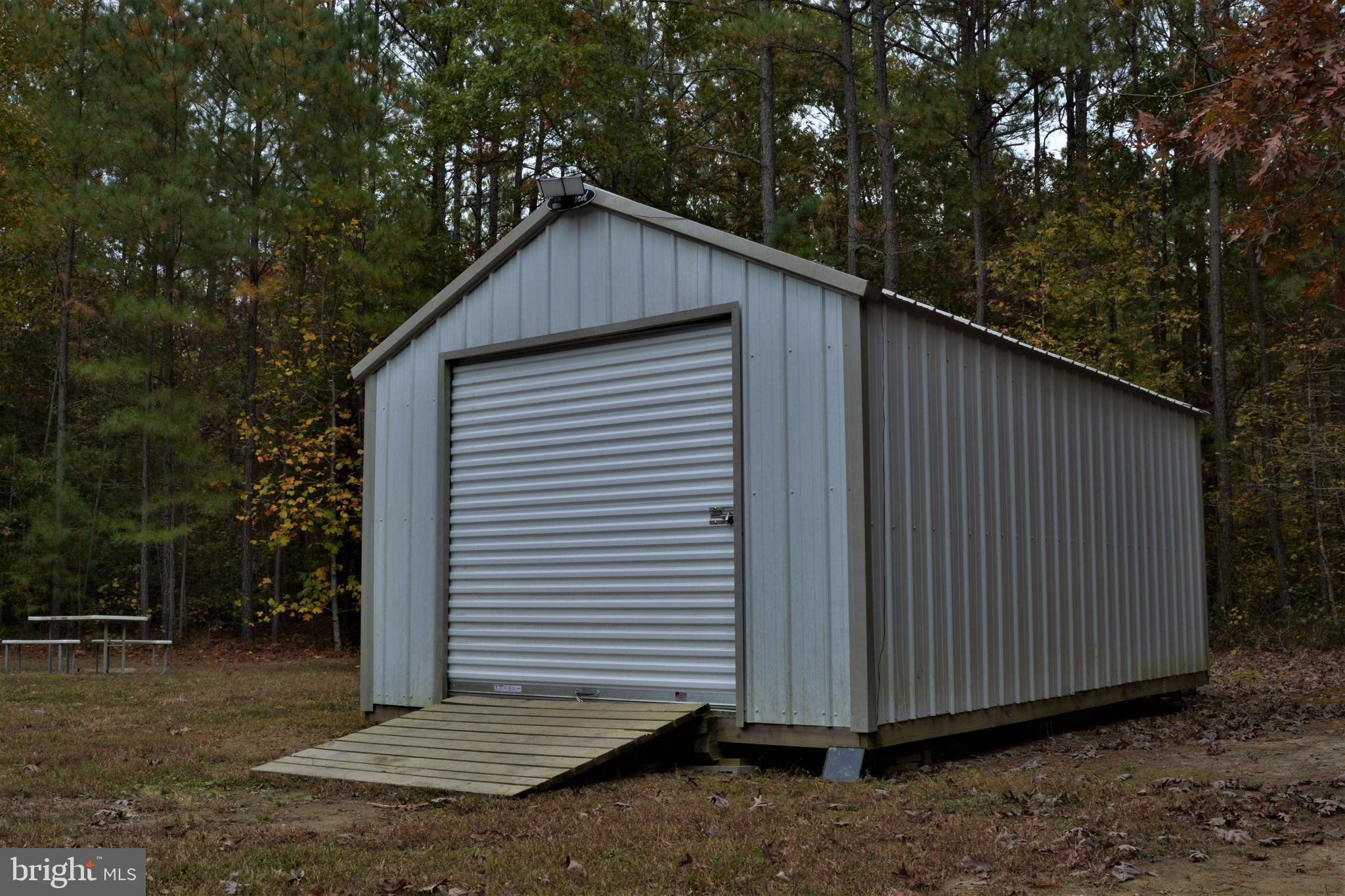 7515 Tate Road Ruther Glen, VA 22546 - Photo 25 of 28 You will have a shed to keep your ATV and tools