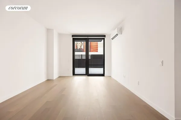 a kitchen with granite countertop white cabinets and stainless steel appliances