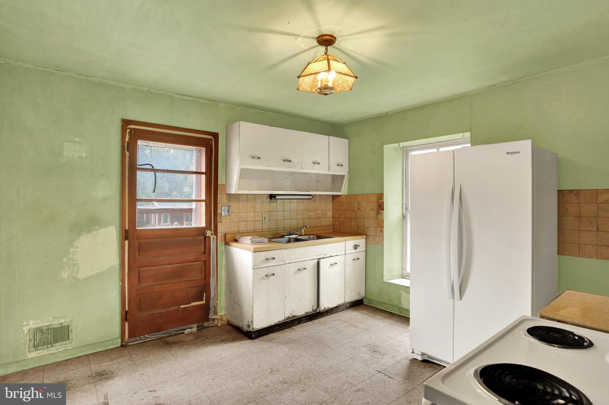 1129 Eagle Point Road Kutztown, PA 19530 - Photo 30 of 41 Right Unit Kitchen showing door to Deck