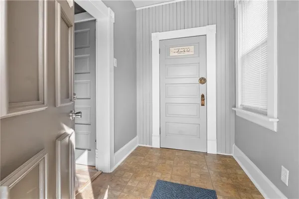 a view of a bathroom from the hallway