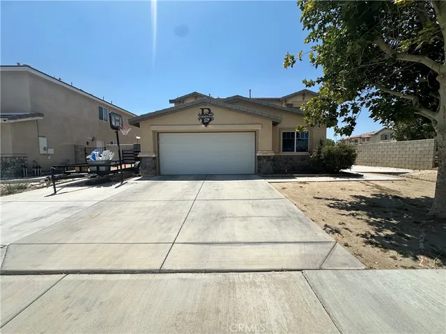a house view with a outdoor space