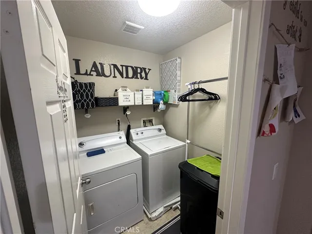 a bedroom with double bed and a window