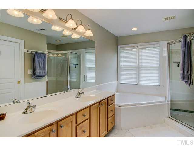 239 Stable Road Carrboro, NC 27510 - Photo 10 of 25 The spacious MASTER BATHROOM has a garden tub, separate shower, dual sink vanity.