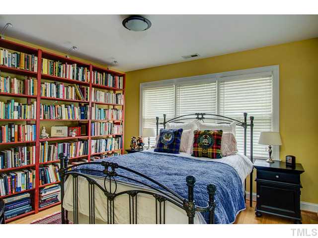 239 Stable Road Carrboro, NC 27510 - Photo 11 of 25 BEDROOM 2 is 11 x 12 and has hardwood floors.