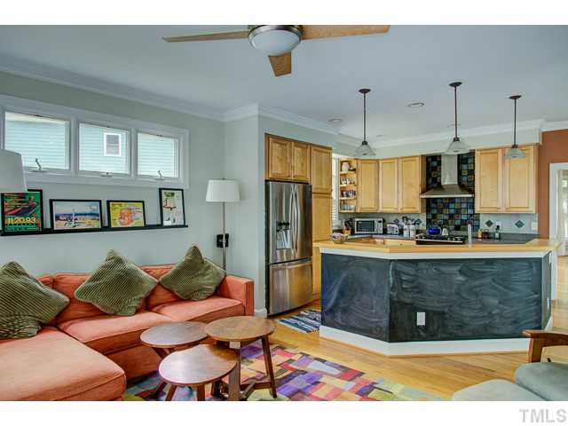 239 Stable Road Carrboro, NC 27510 - Photo 25 of 25 The roominess of the open floor plan design is evident looking from the family room into the KITCHEN area.