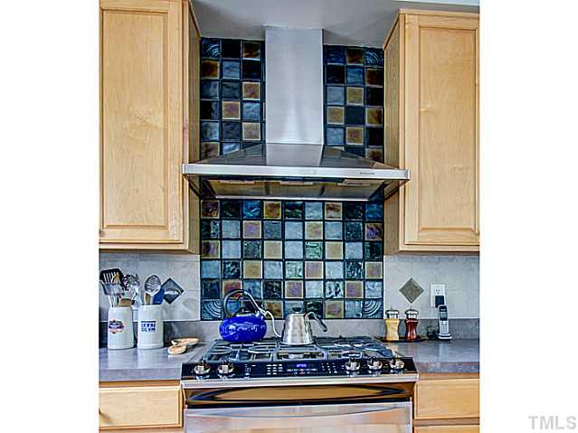 239 Stable Road Carrboro, NC 27510 - Photo 6 of 25 The KITCHEN features upgraded appliances from Kenmore Elite, Kitchen Aid, and Bosch.