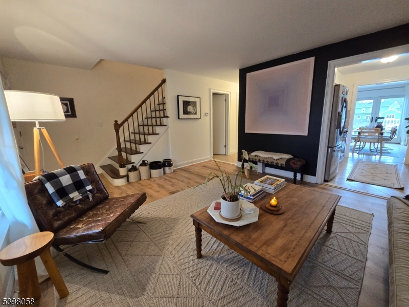 87 East Main Street, Unit 87B Mendham, NJ 07945 - Photo 13 of 27 a living room with furniture and wooden floor
