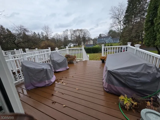 a view of balcony with furniture