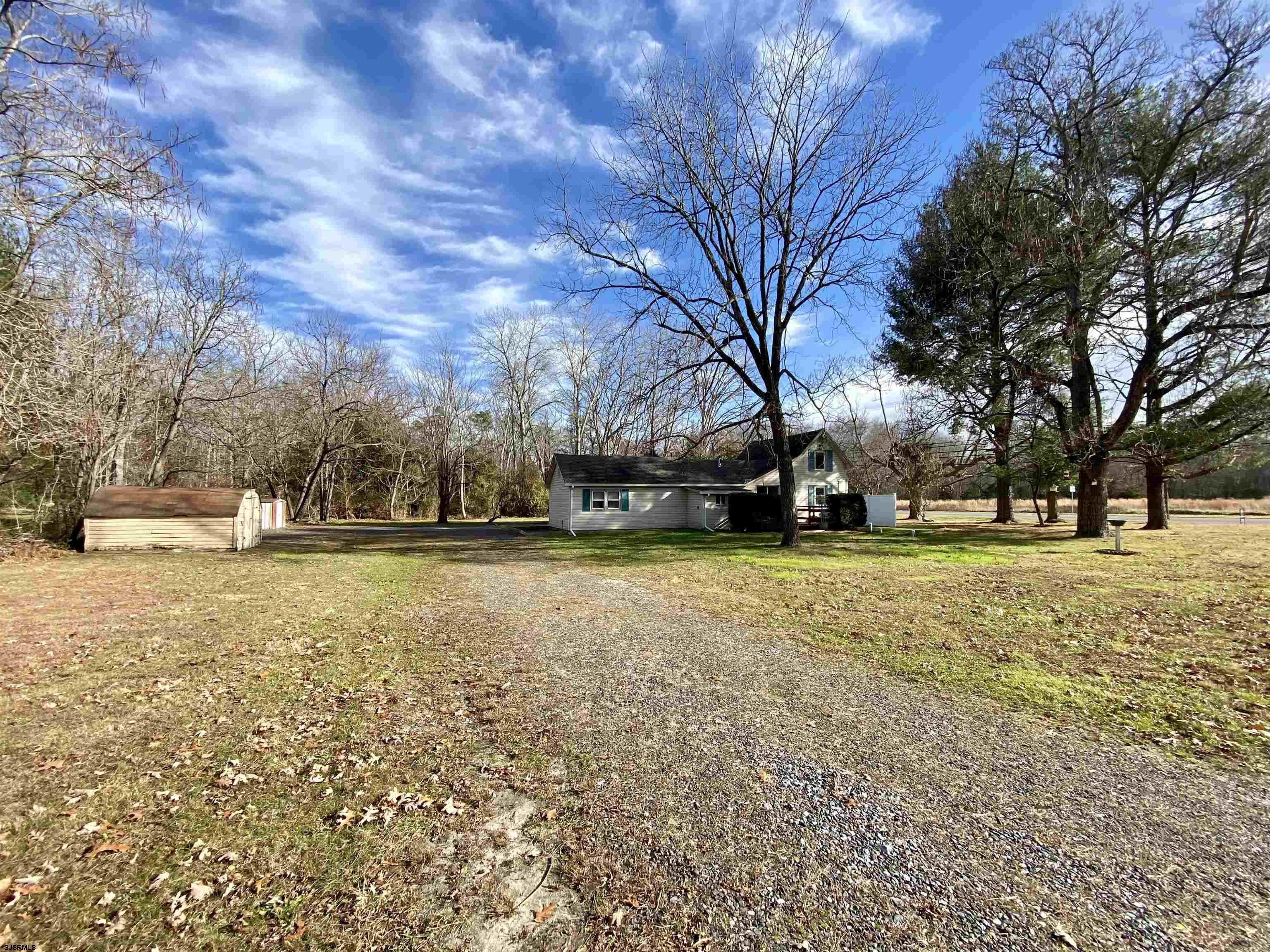 201 Broad Street Milmay, NJ 08340 - Photo 19 of 23 a view of yard with trees