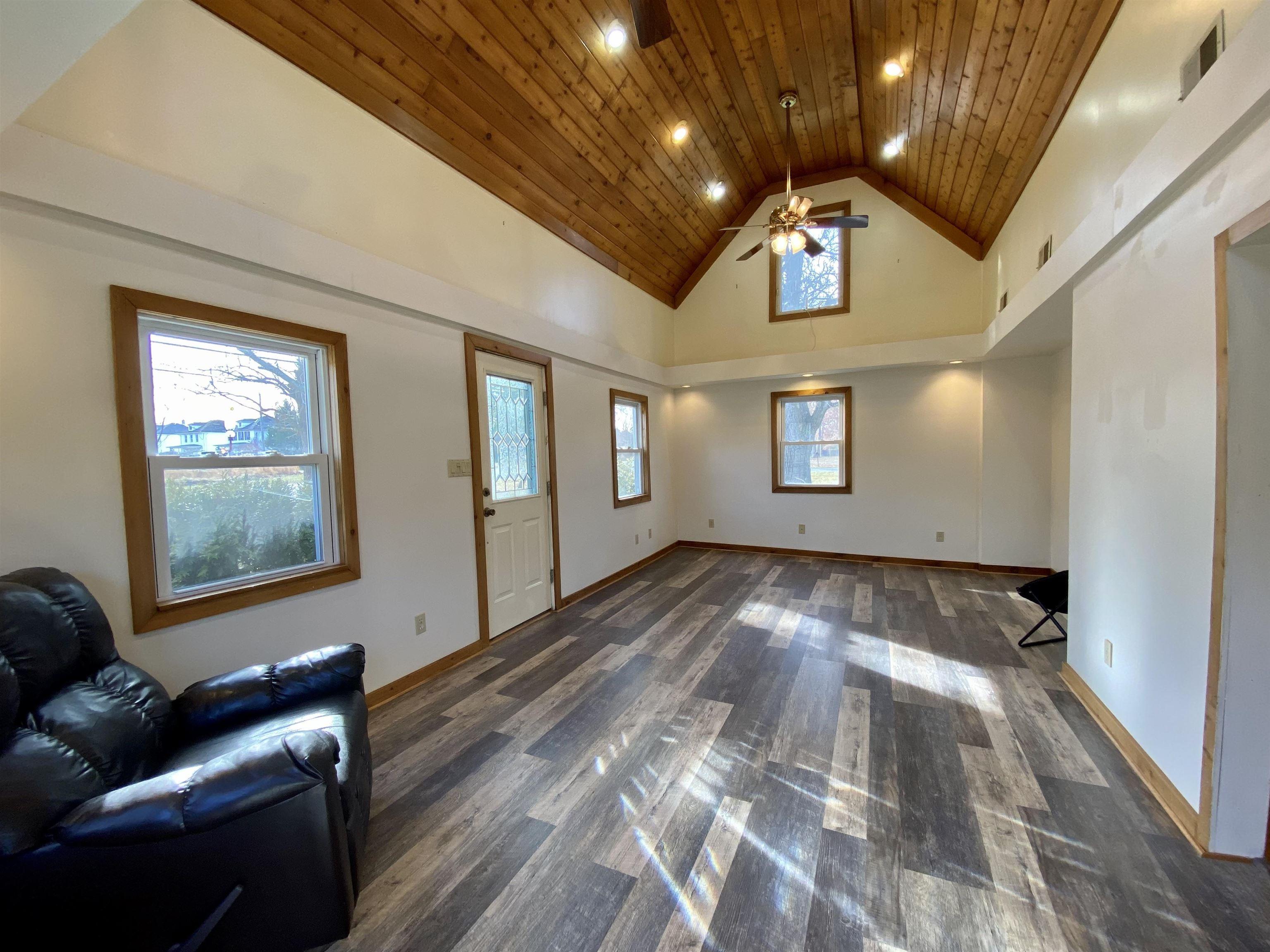 201 Broad Street Milmay, NJ 08340 - Photo 4 of 23 a view of empty room with wooden floor