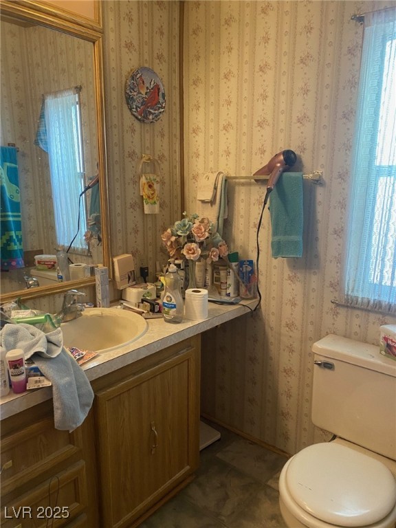 18 Pine Street Ruth, NV 89319 - Photo 11 of 12 Bathroom with vanity and wallpapered walls