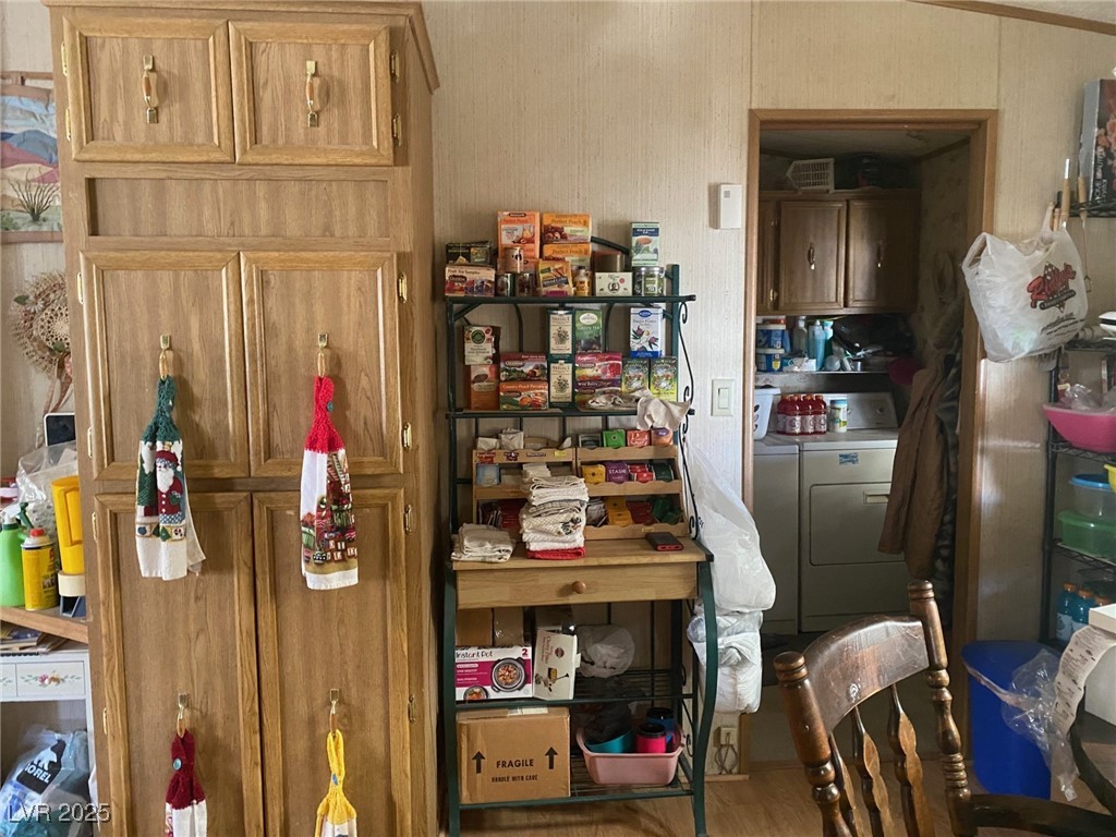 18 Pine Street Ruth, NV 89319 - Photo 5 of 12 Storage area featuring washing machine and clothes dryer