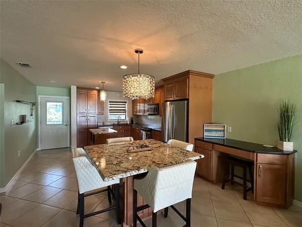 a view of a dining room with furniture