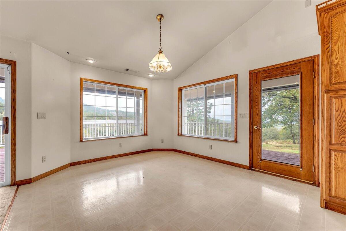 30153 Frisby Road Oak Run, CA 96069 - Photo 13 of 56 a view of an empty room with a window