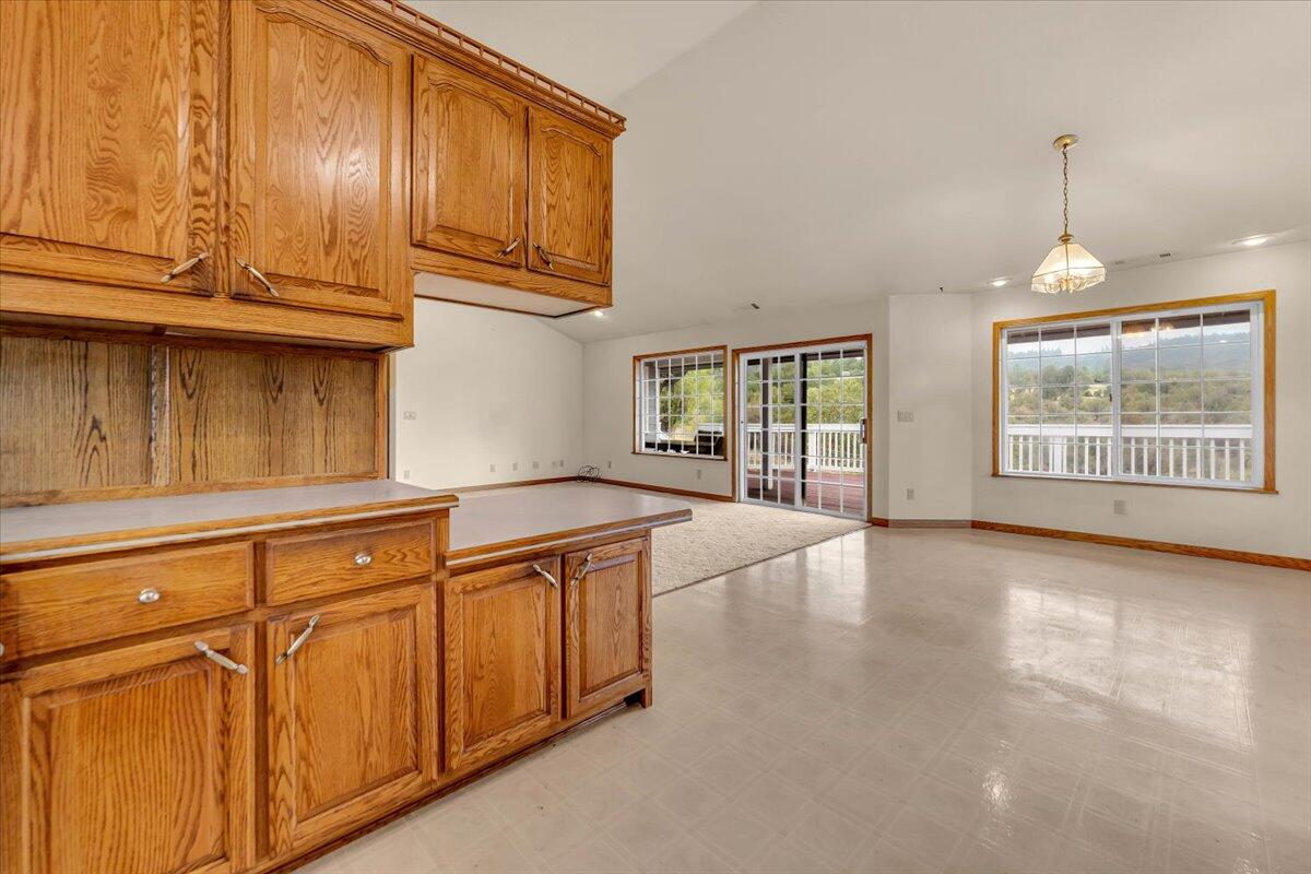 30153 Frisby Road Oak Run, CA 96069 - Photo 17 of 56 a view of a kitchen with furniture and chandelier