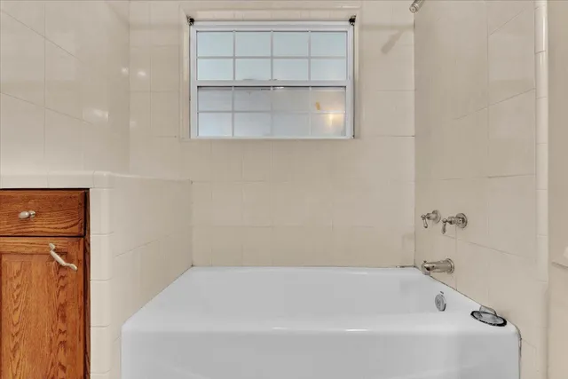 a view of a room with wooden floor and balcony