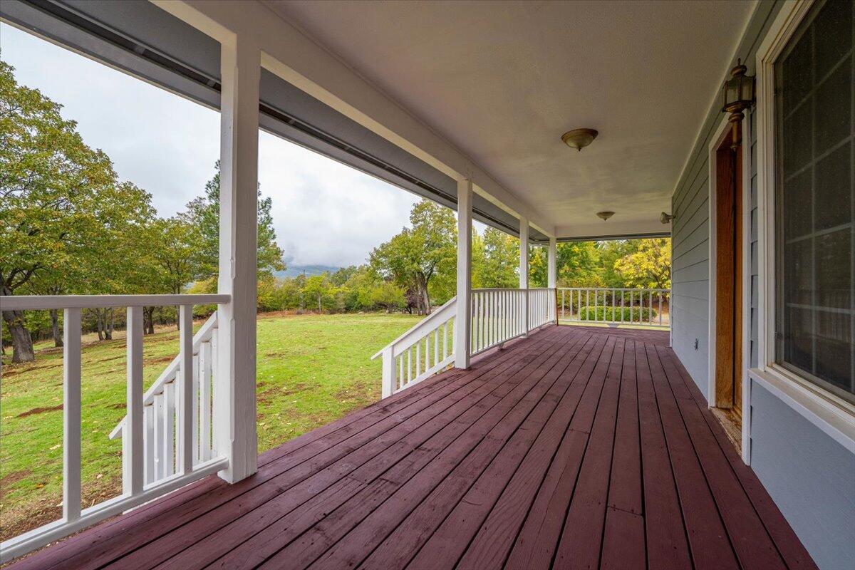 30153 Frisby Road Oak Run, CA 96069 - Photo 33 of 56 a view of balcony with wooden floor