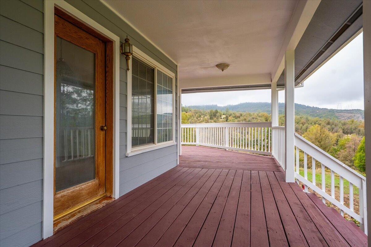 30153 Frisby Road Oak Run, CA 96069 - Photo 35 of 56 a view of a room with wooden floor and balcony