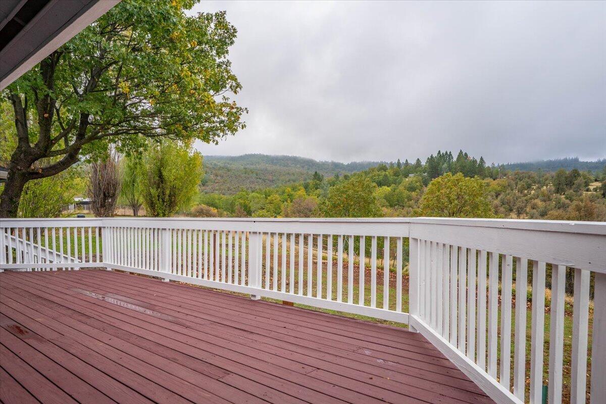30153 Frisby Road Oak Run, CA 96069 - Photo 36 of 56 a view of balcony with wooden floor and fence