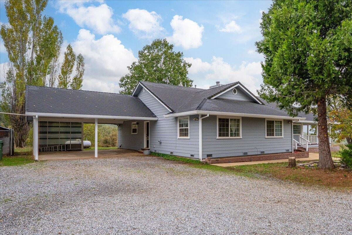 30153 Frisby Road Oak Run, CA 96069 - Photo 4 of 56 a front view of a house with garden