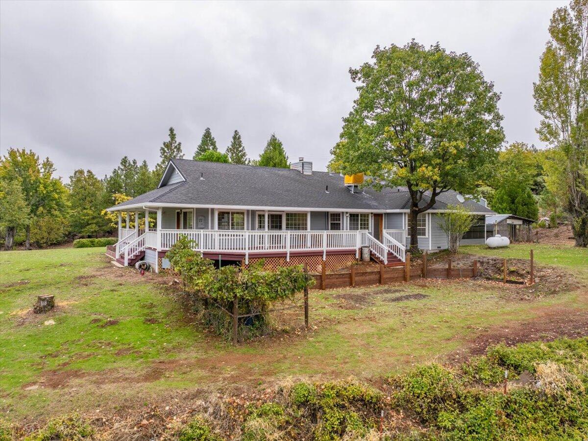 30153 Frisby Road Oak Run, CA 96069 - Photo 45 of 56 a front view of a house with garden