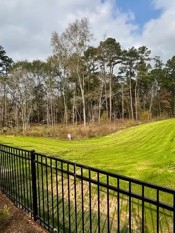 a view of swimming pool from a outdoor space