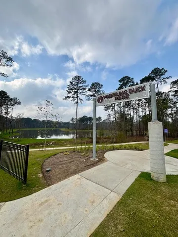 a view of a playground with a terrace