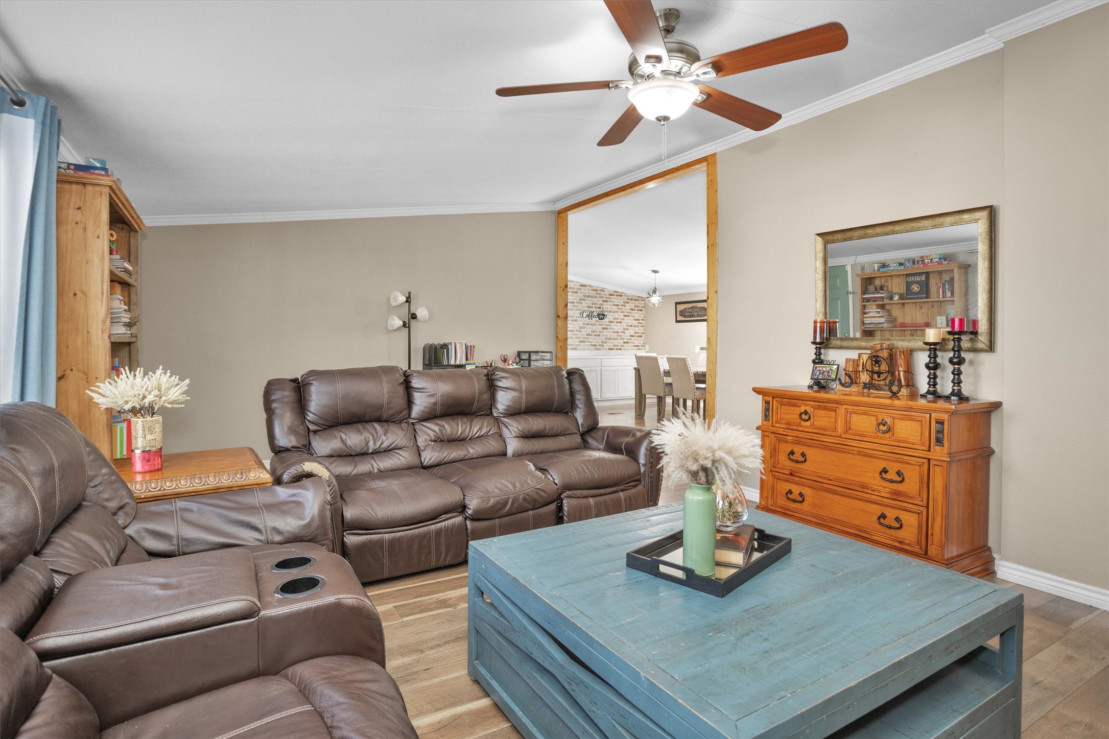 14604 Hasara Lane Willis, TX 77378 - Photo 15 of 50 a living room with furniture a chandelier and a table