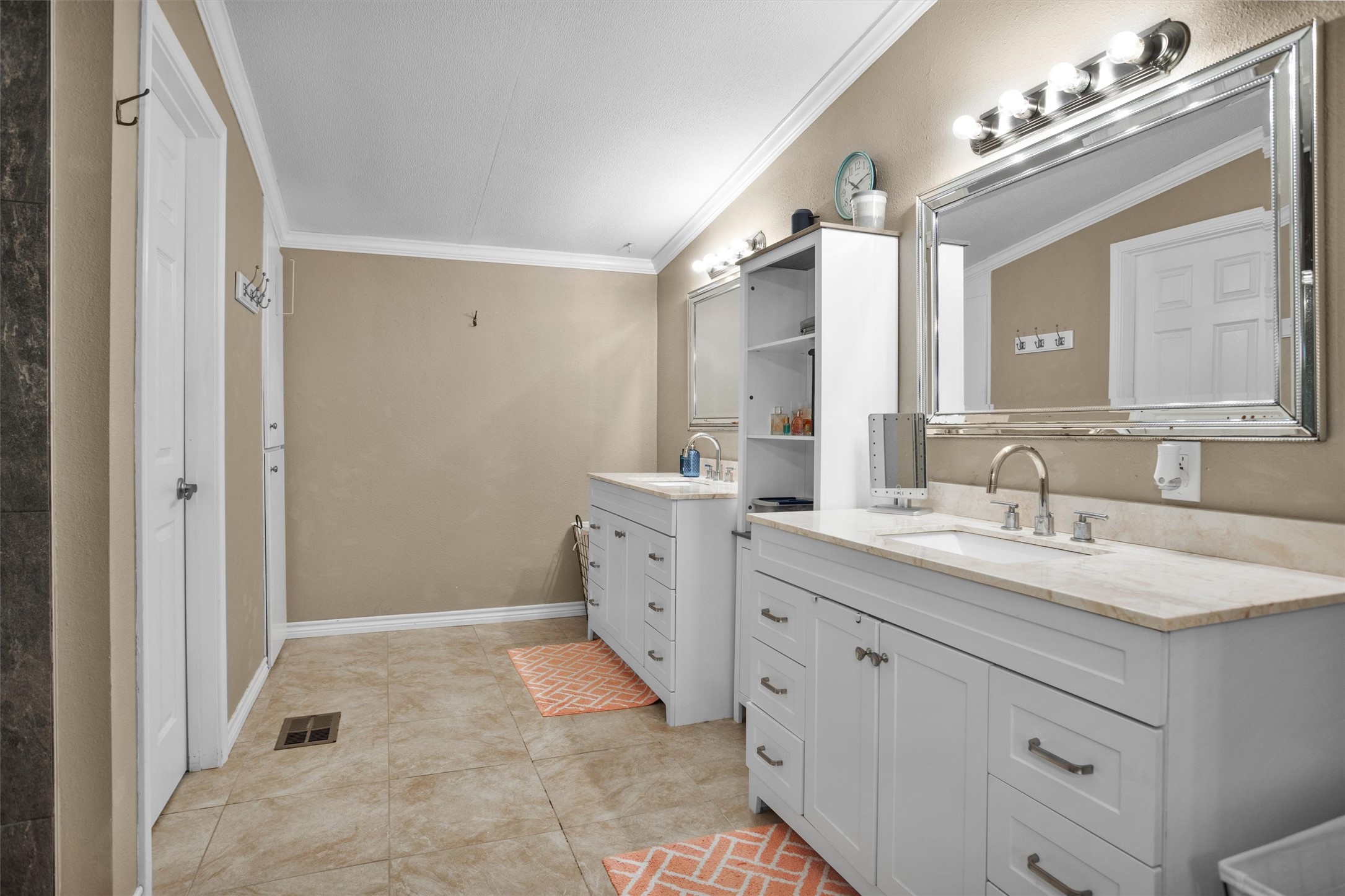 14604 Hasara Lane Willis, TX 77378 - Photo 27 of 50 a spacious bathroom with a double vanity sink mirror and