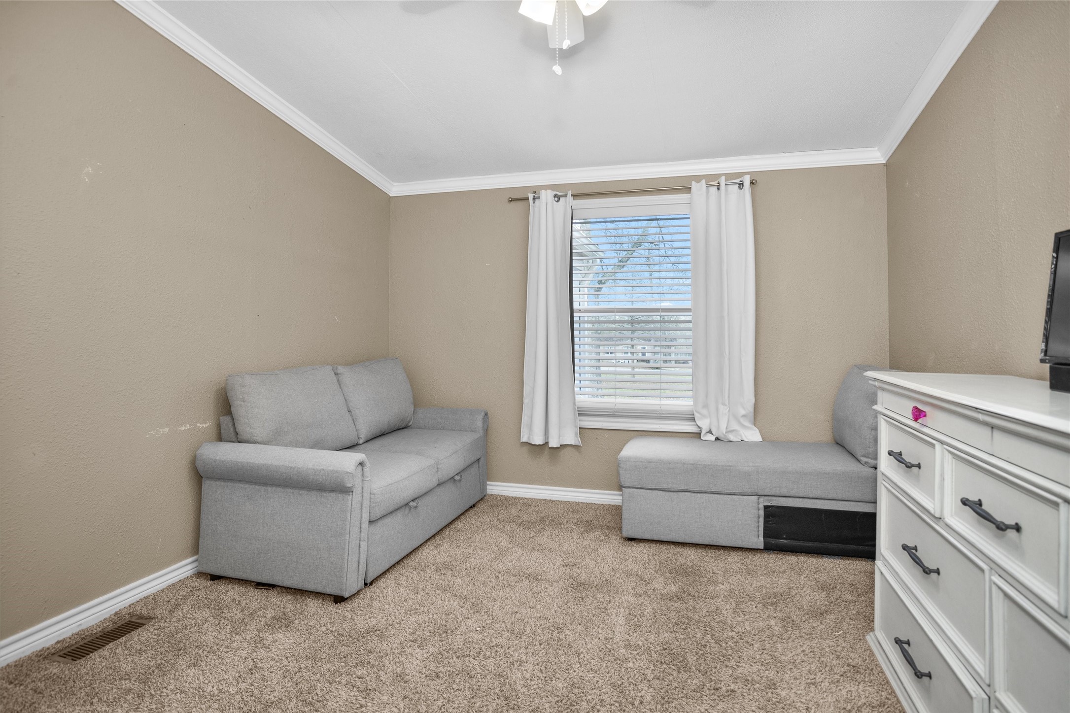 14604 Hasara Lane Willis, TX 77378 - Photo 36 of 50 a living room with furniture and a window