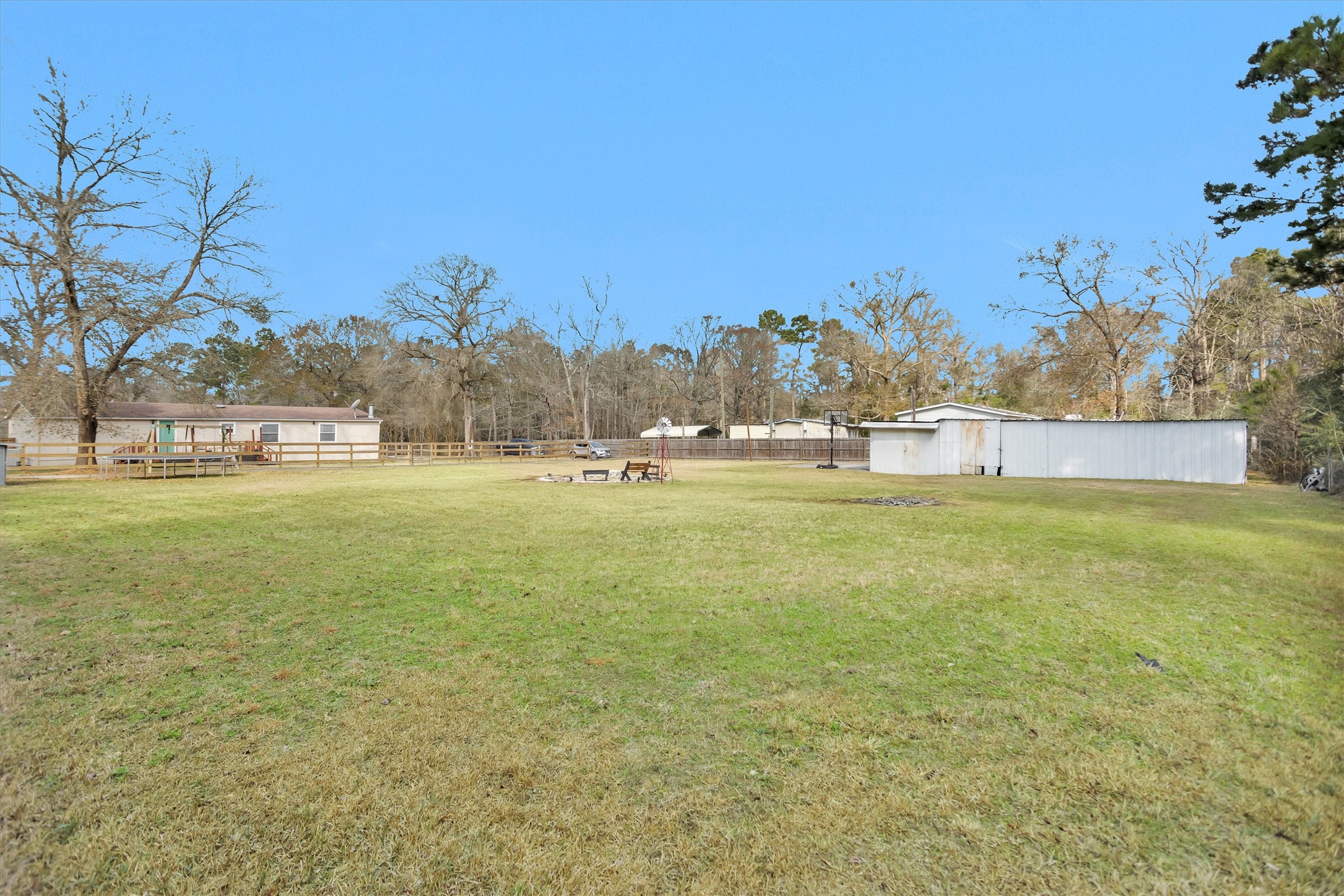 14604 Hasara Lane Willis, TX 77378 - Photo 46 of 50 a view of an ocean with a building in the background