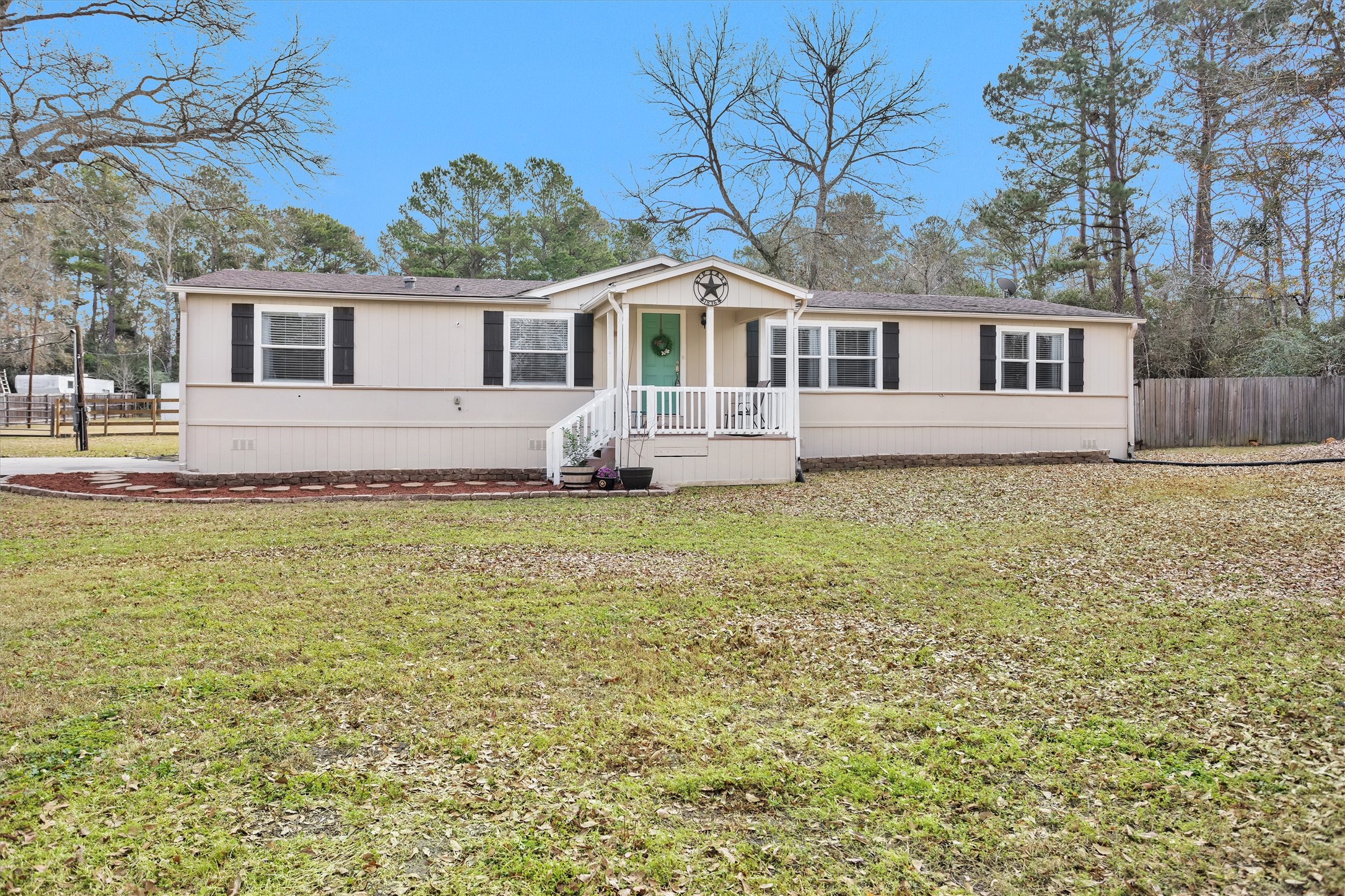 14604 Hasara Lane Willis, TX 77378 - Photo 7 of 50 a front view of a house with a yard