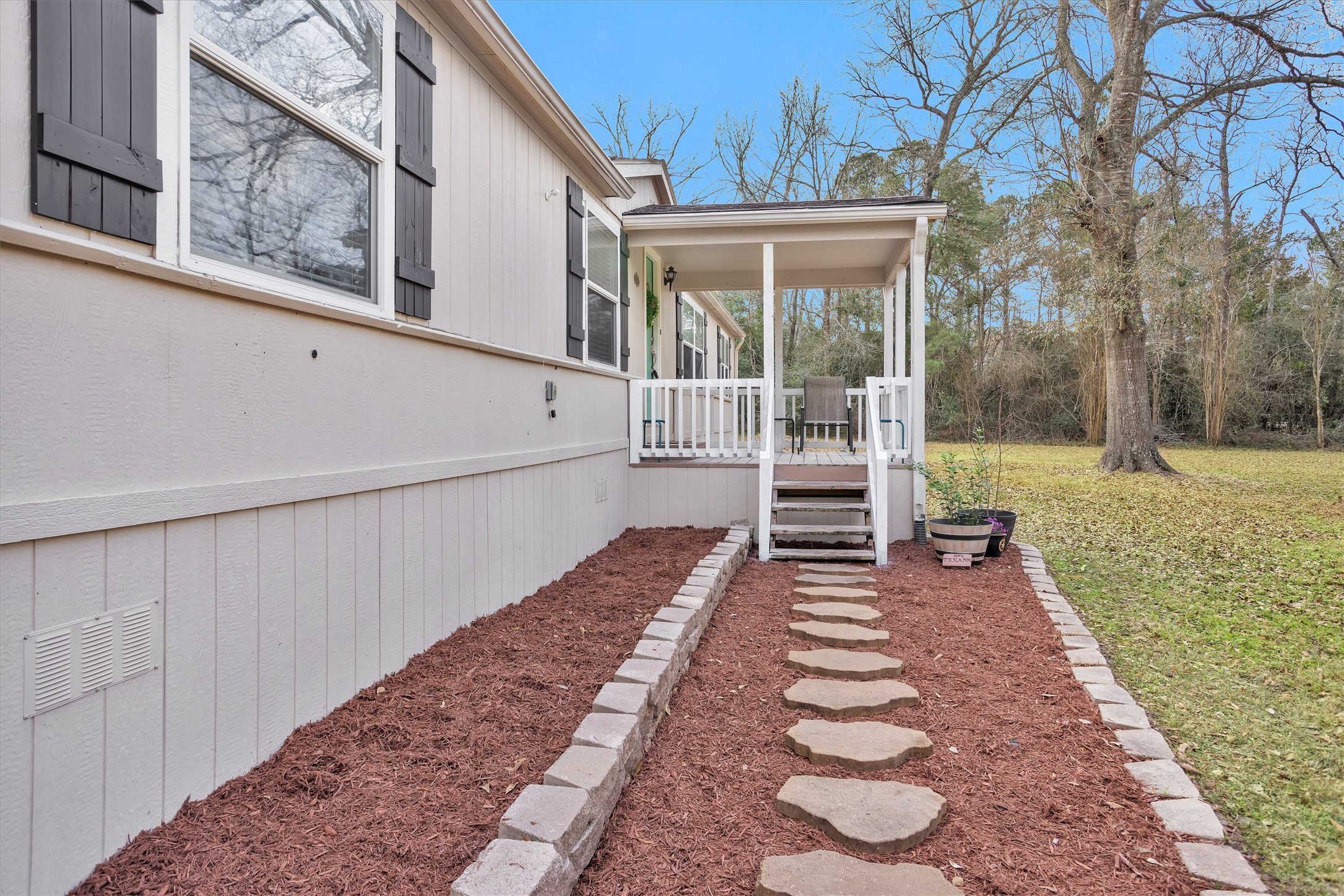 14604 Hasara Lane Willis, TX 77378 - Photo 8 of 50 a view of a house with a yard