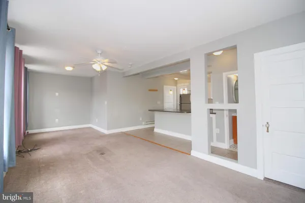 a bathroom with a sink a mirror and a shower