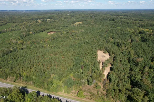 a view of a yard with an outdoor space