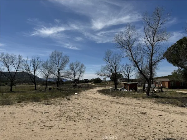 a view of house covered with snow in outdoor space