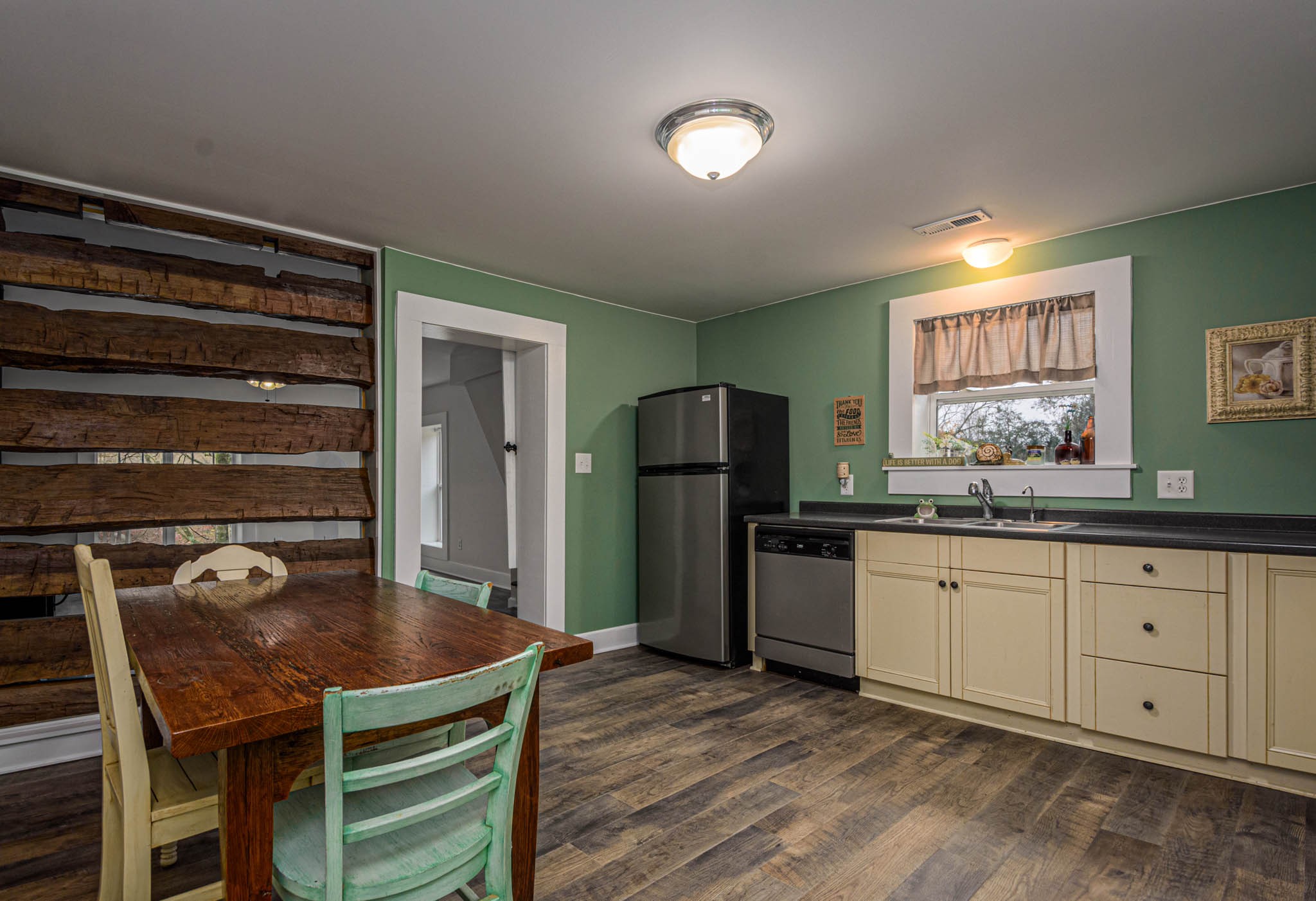 1828 Bunker Hill Road Pulaski, TN 38478 - Photo 14 of 57 a kitchen with stainless steel appliances granite countertop a refrigerator and a stove top oven