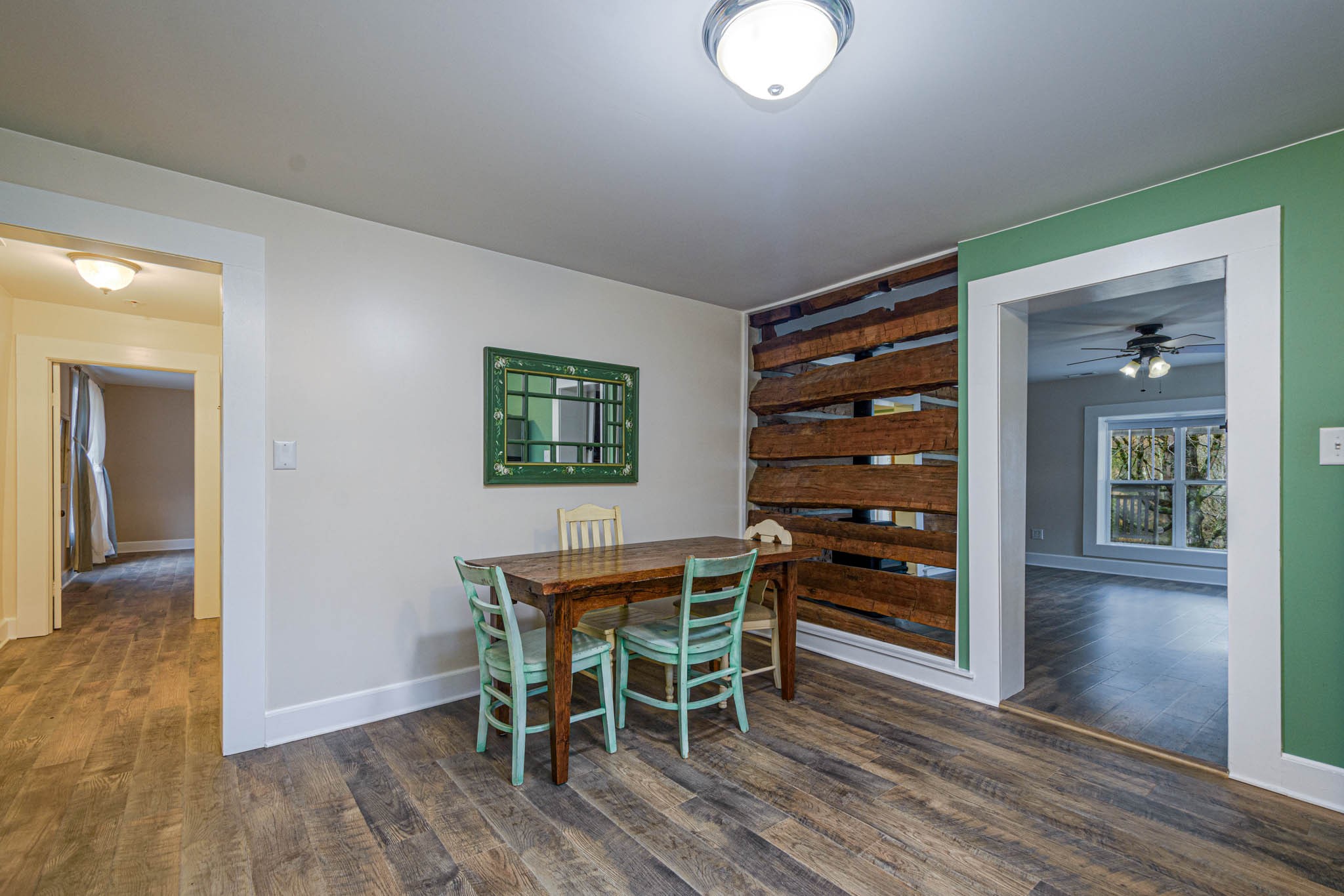 1828 Bunker Hill Road Pulaski, TN 38478 - Photo 16 of 57 a view of a dining room with furniture and wooden floor