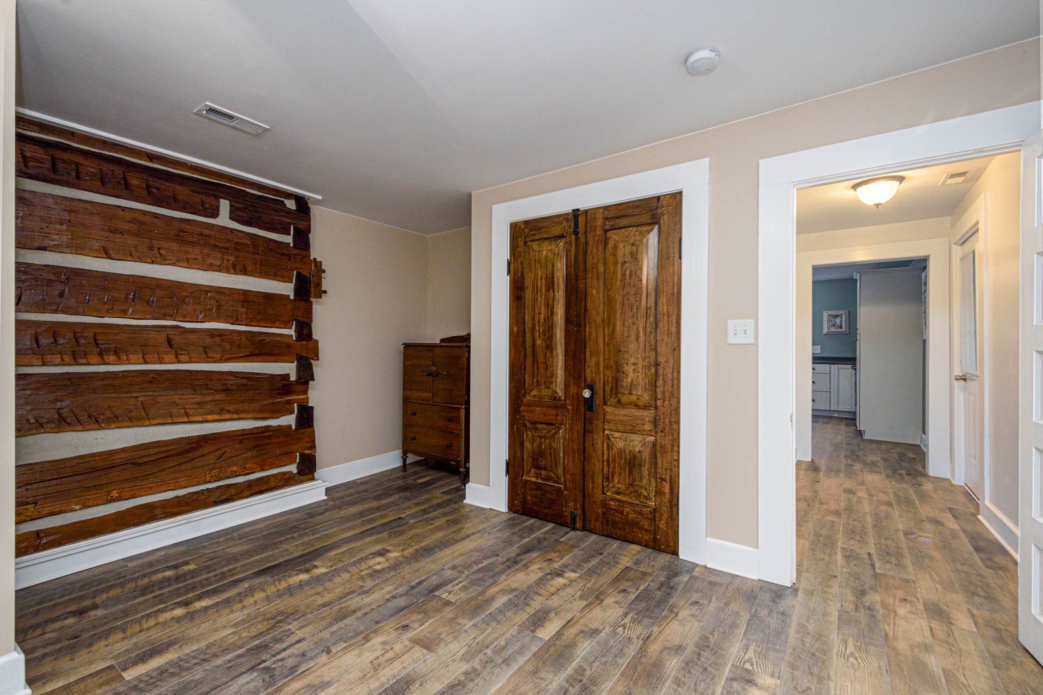 1828 Bunker Hill Road Pulaski, TN 38478 - Photo 22 of 57 a view of an empty room with wooden floor and closet
