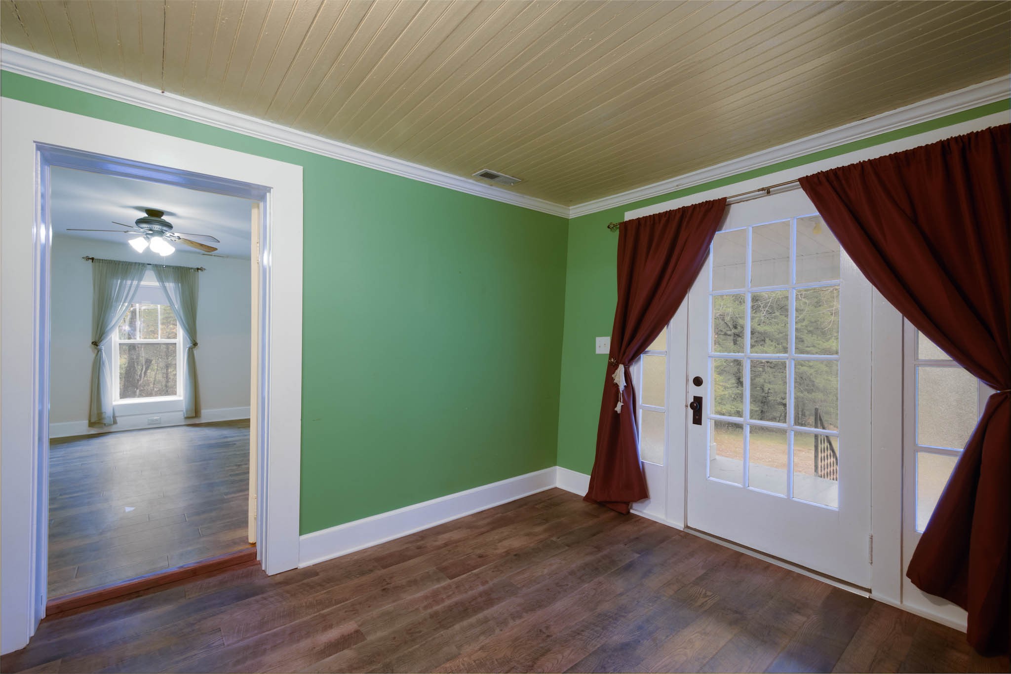 1828 Bunker Hill Road Pulaski, TN 38478 - Photo 27 of 57 an empty room with wooden floor and windows