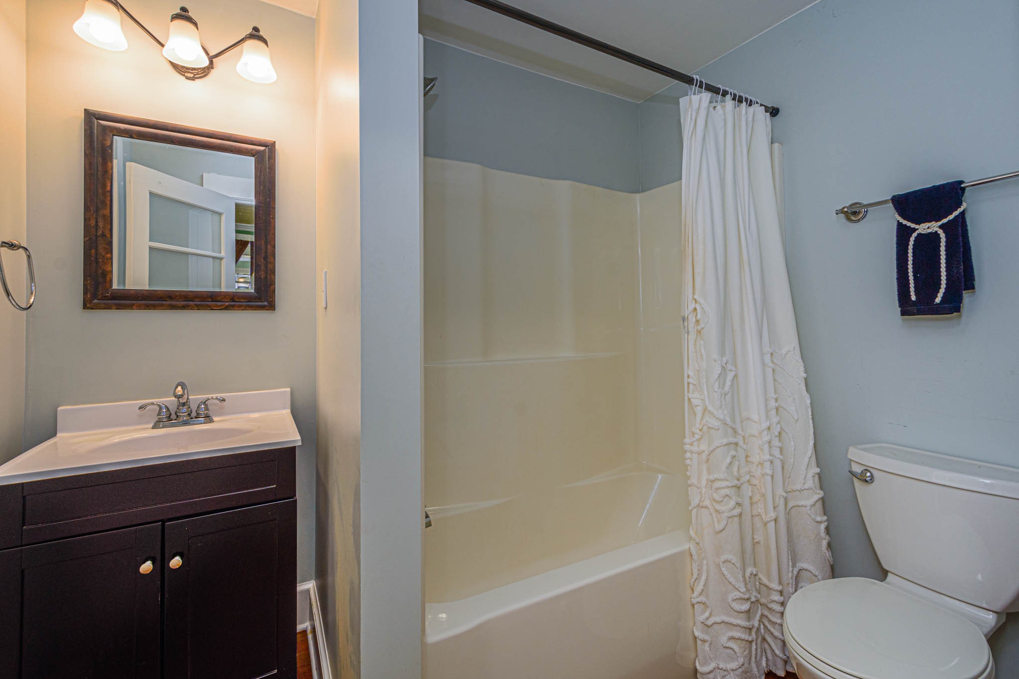 1828 Bunker Hill Road Pulaski, TN 38478 - Photo 32 of 57 a bathroom with a toilet sink vanity tub and mirror