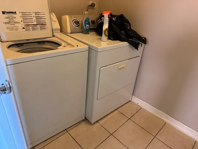 a utility room with dryer and washer