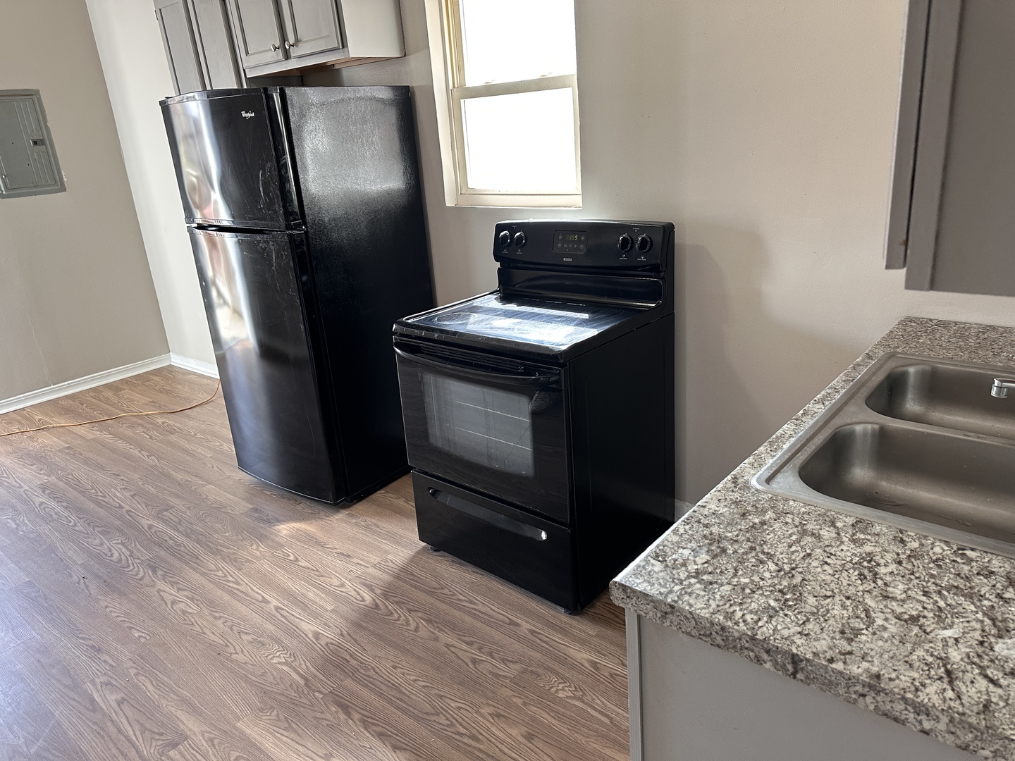 4107 West 16th Street Chicago, IL 60623 - Photo 19 of 29 a kitchen with stainless steel appliances granite countertop a refrigerator a sink a stove and dishwasher