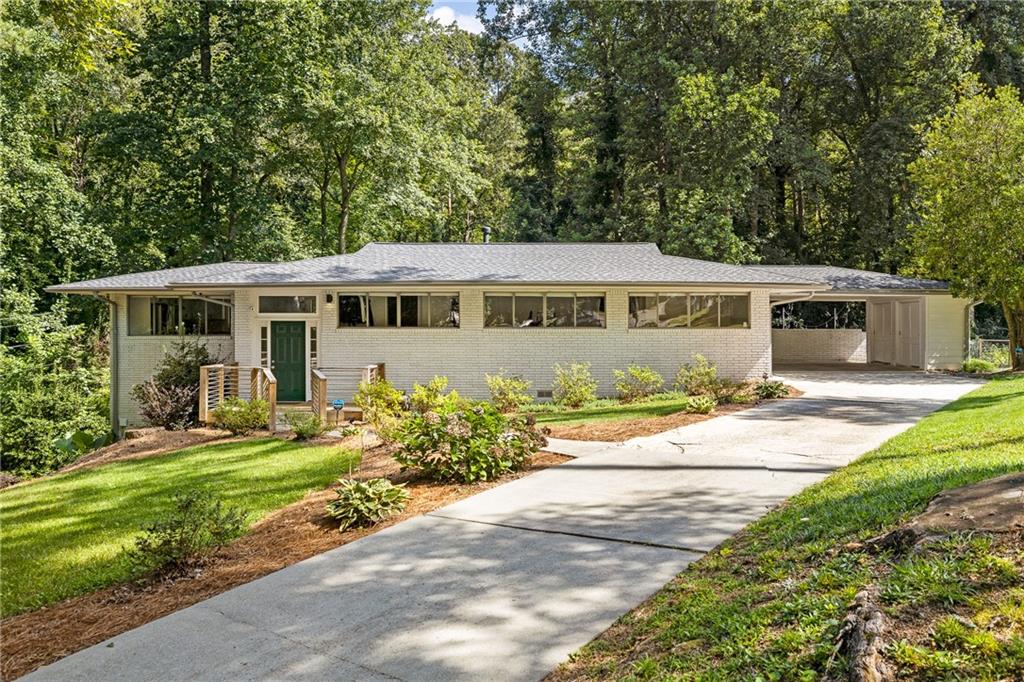 2364 Cresta Drive Decatur, GA 30032 - Photo 1 of 1 a view of a house with a yard