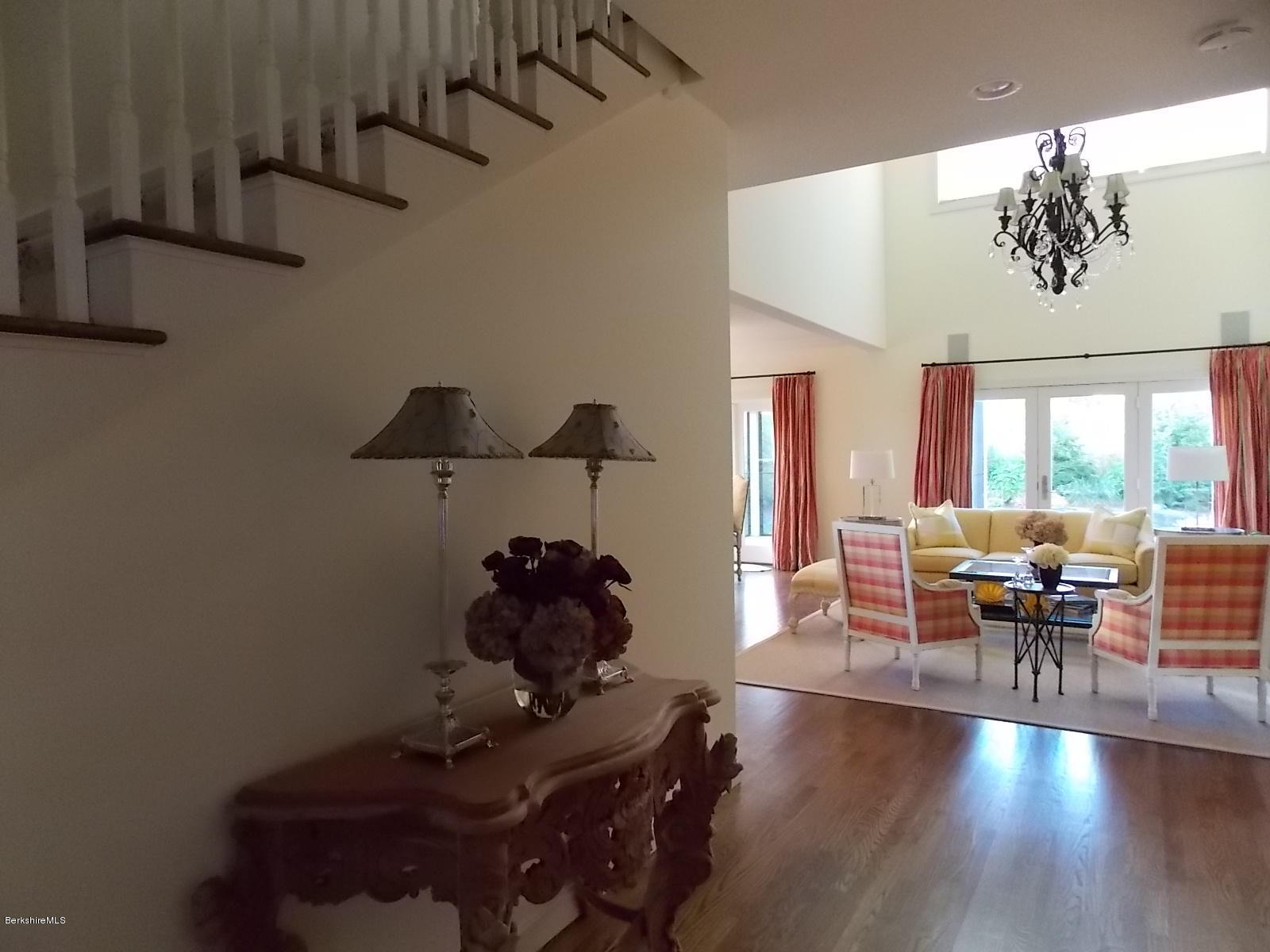 18 High Crest Road, Unit 18 Lenox, MA 01240 - Photo 16 of 34 a living room with furniture and wooden floor