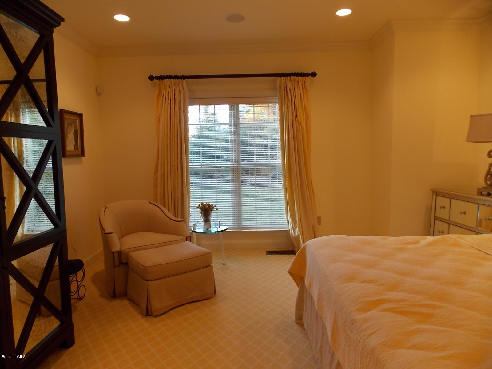 18 High Crest Road, Unit 18 Lenox, MA 01240 - Photo 20 of 34 a bedroom with a bed and a window