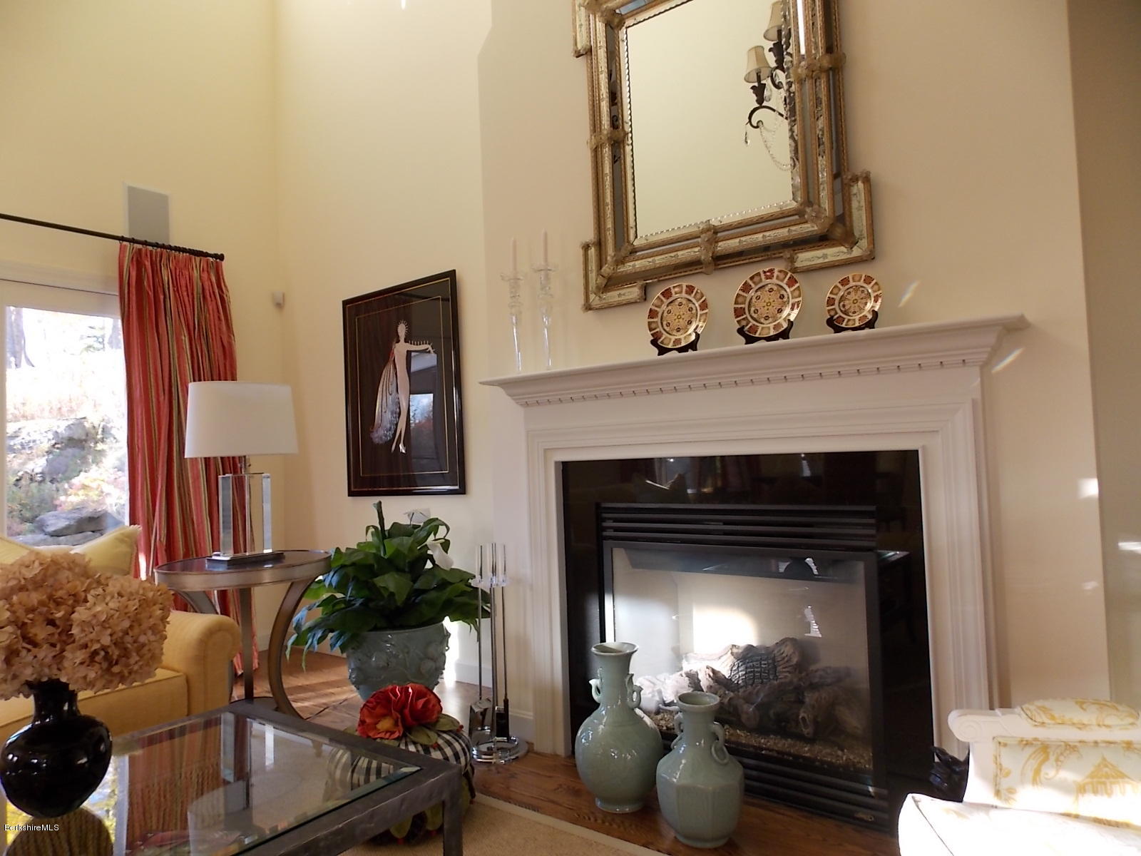 18 High Crest Road, Unit 18 Lenox, MA 01240 - Photo 21 of 34 a living room with furniture and a fireplace