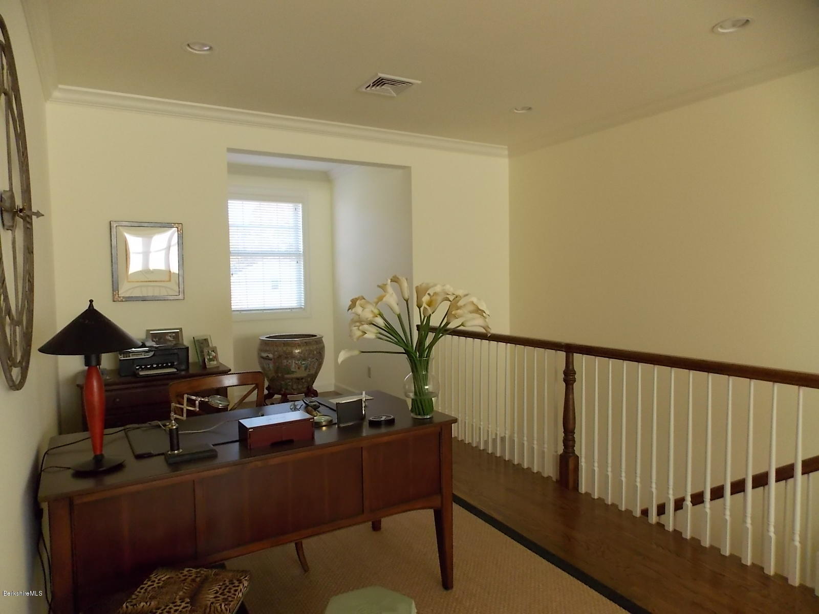 18 High Crest Road, Unit 18 Lenox, MA 01240 - Photo 25 of 34 a living room with furniture lamp and a window