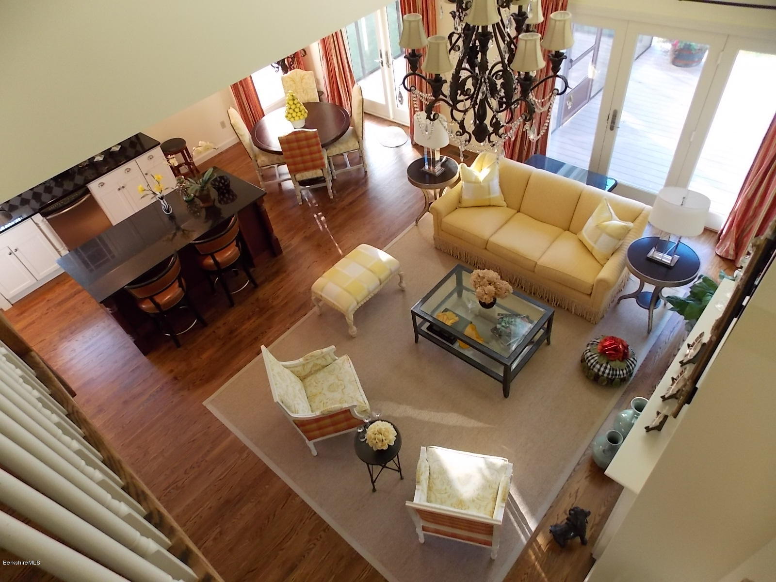 18 High Crest Road, Unit 18 Lenox, MA 01240 - Photo 29 of 34 a living room with furniture and floor to ceiling windows